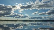 Blue sky and Clouds over Body of Water